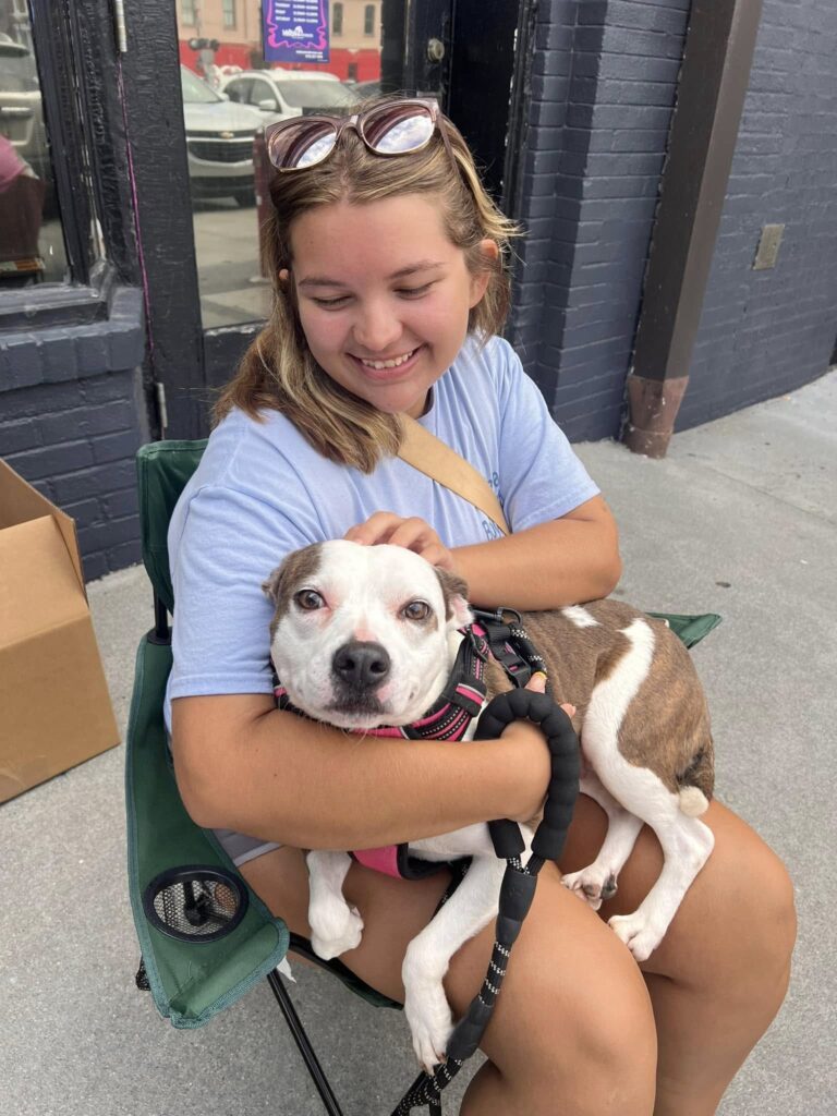 volunteer with a dog